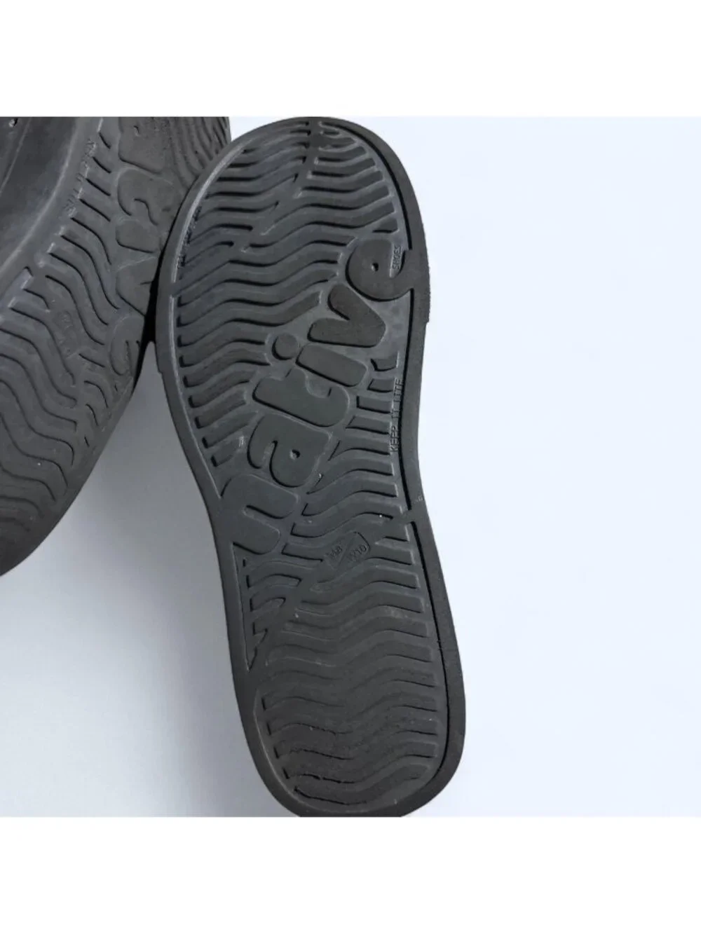 Native black slip-on clogs